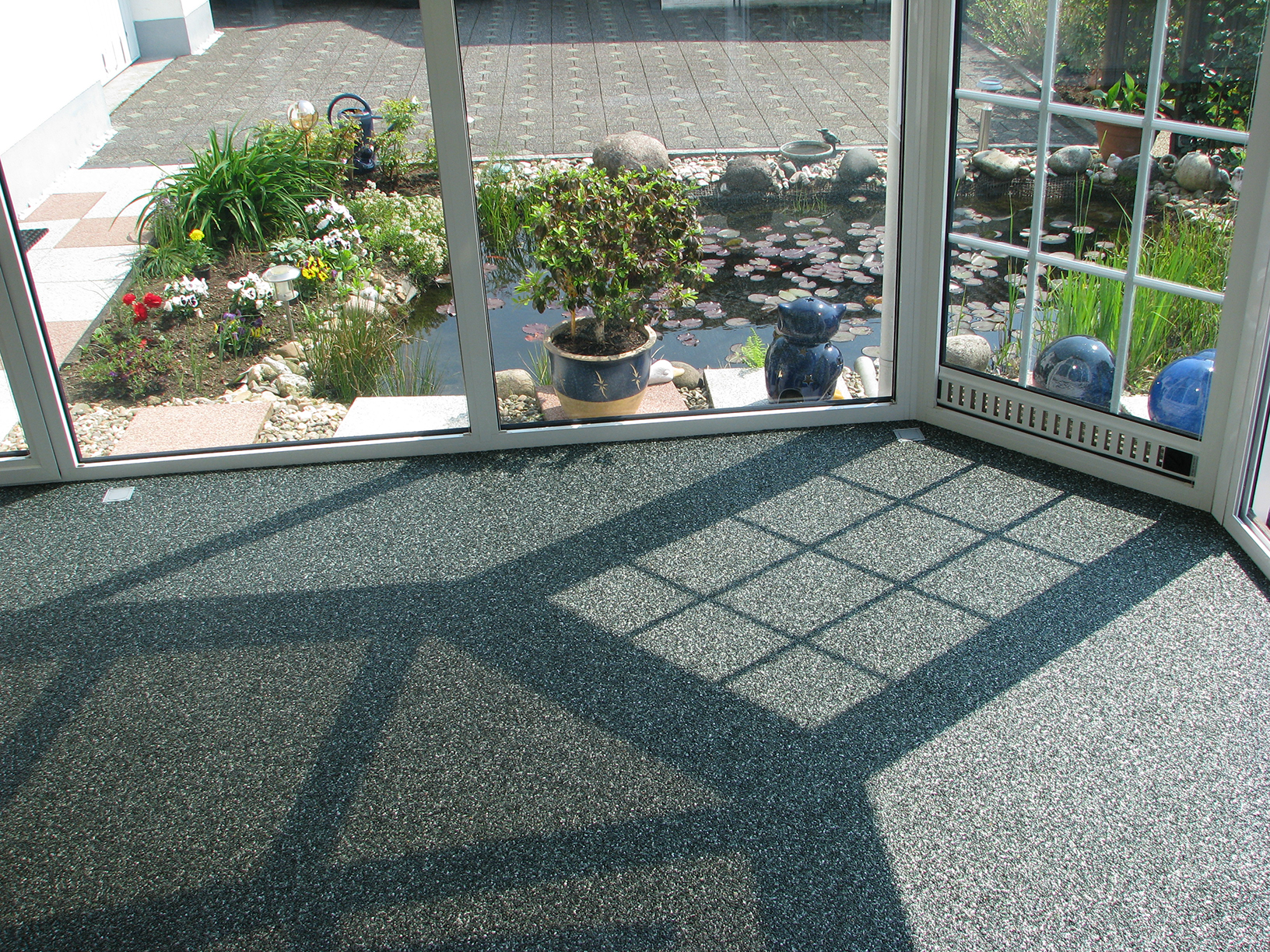 Quarzkiesboden Wintergarten